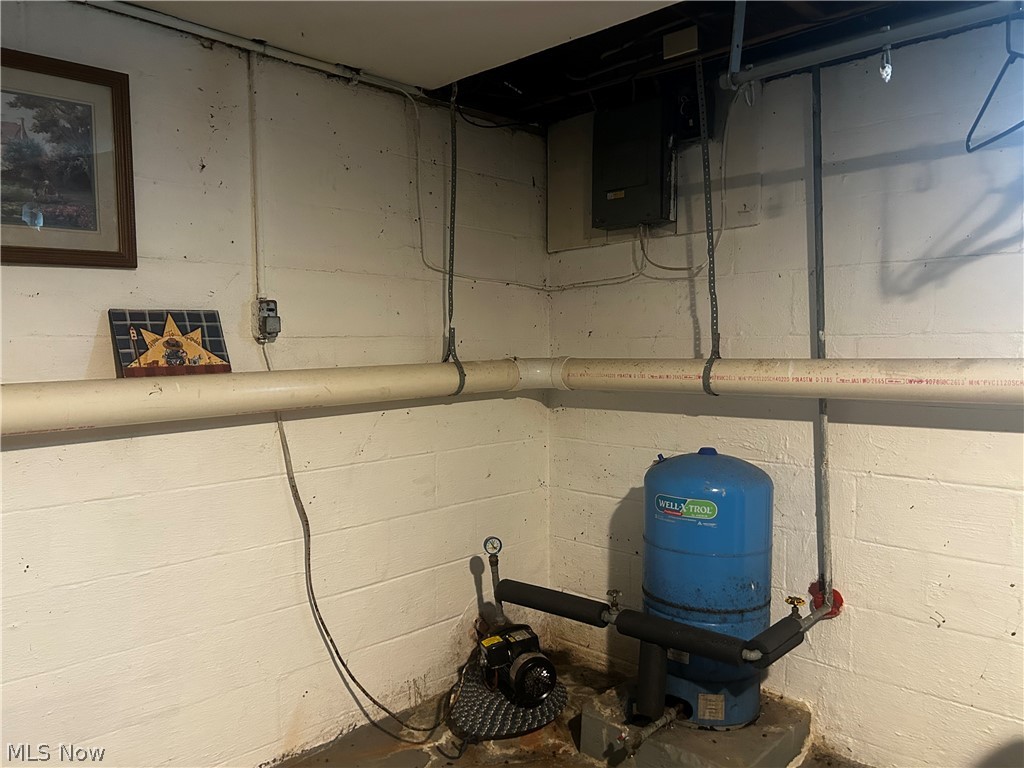 5742 Grove Road Clinton, OH 44216 - Photo 36 of 37 Well Pump in basement