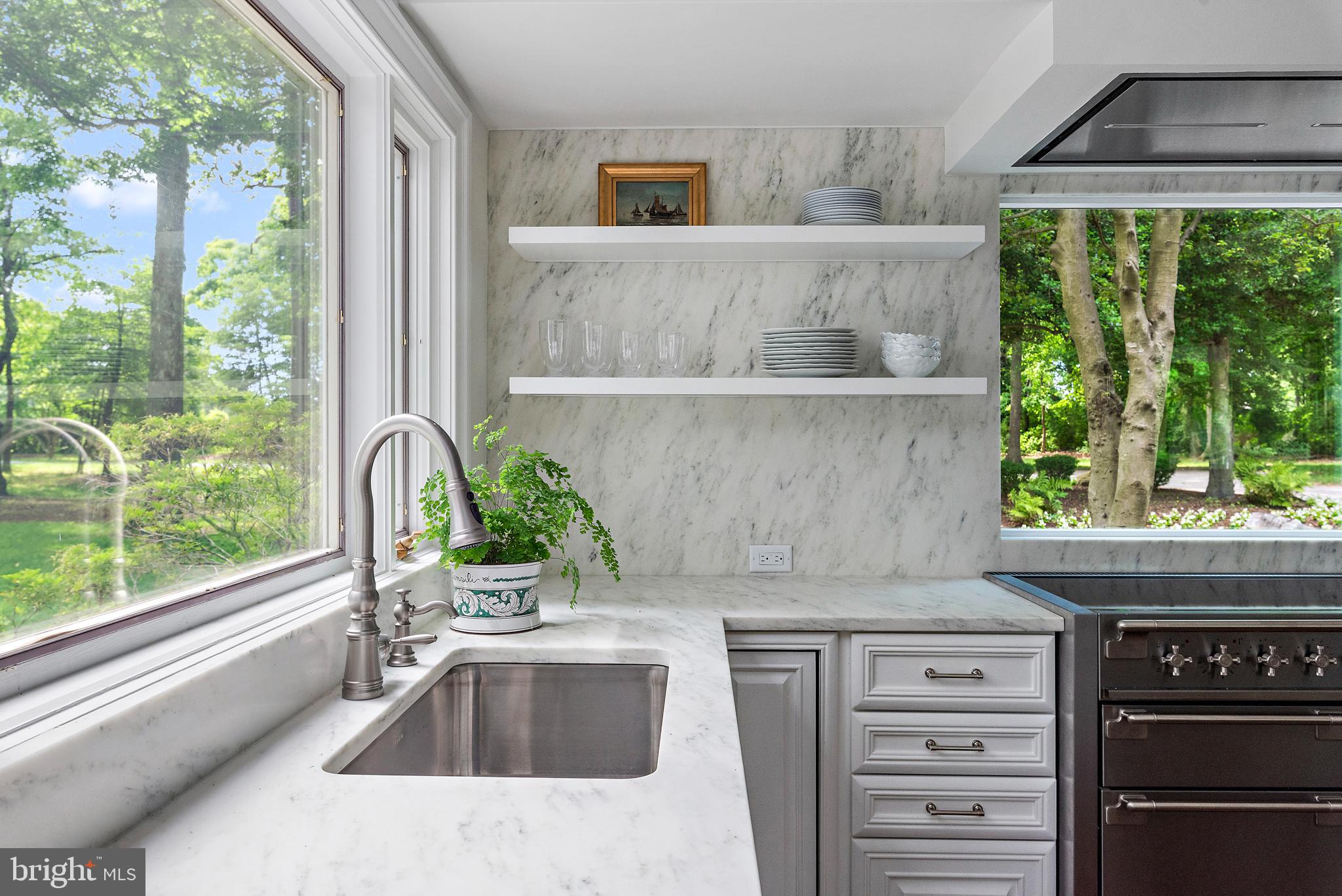 1879 Whitehall Road Annapolis, MD 21409 - Photo 25 of 78 a kitchen with a sink and a large window
