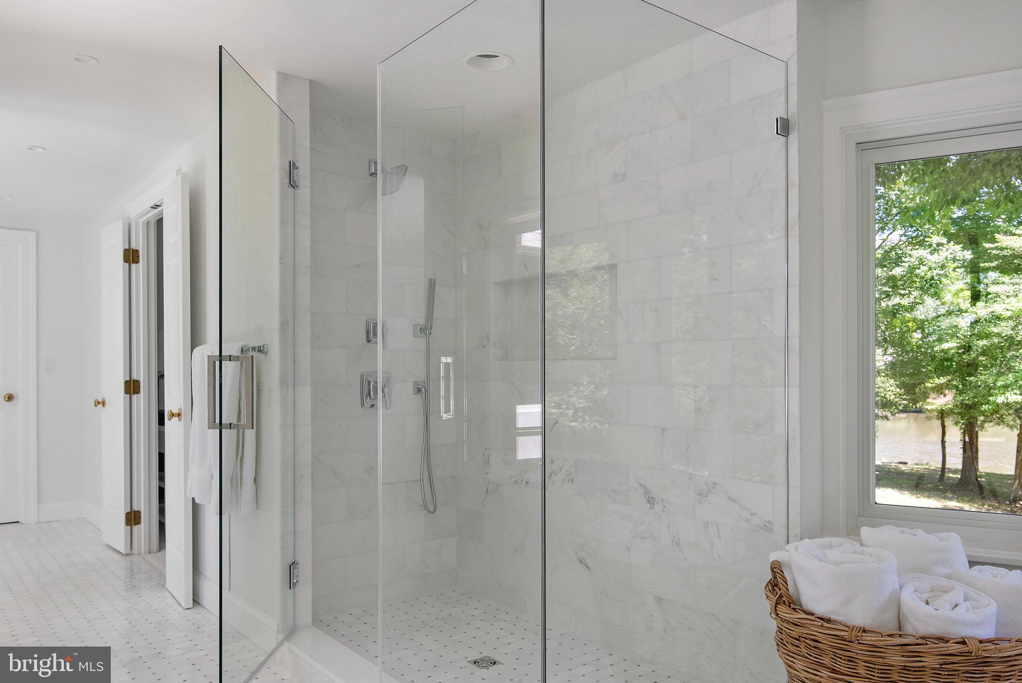 1879 Whitehall Road Annapolis, MD 21409 - Photo 42 of 78 a bathroom with a granite countertop shower and a sink
