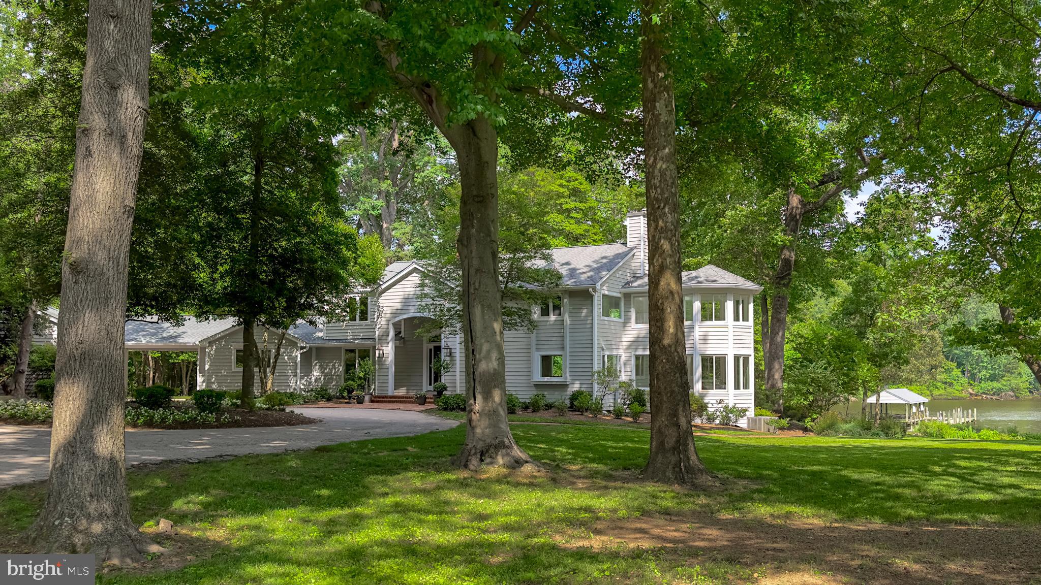 1879 Whitehall Road Annapolis, MD 21409 - Photo 62 of 78 a view of house in front of a big yard with large trees