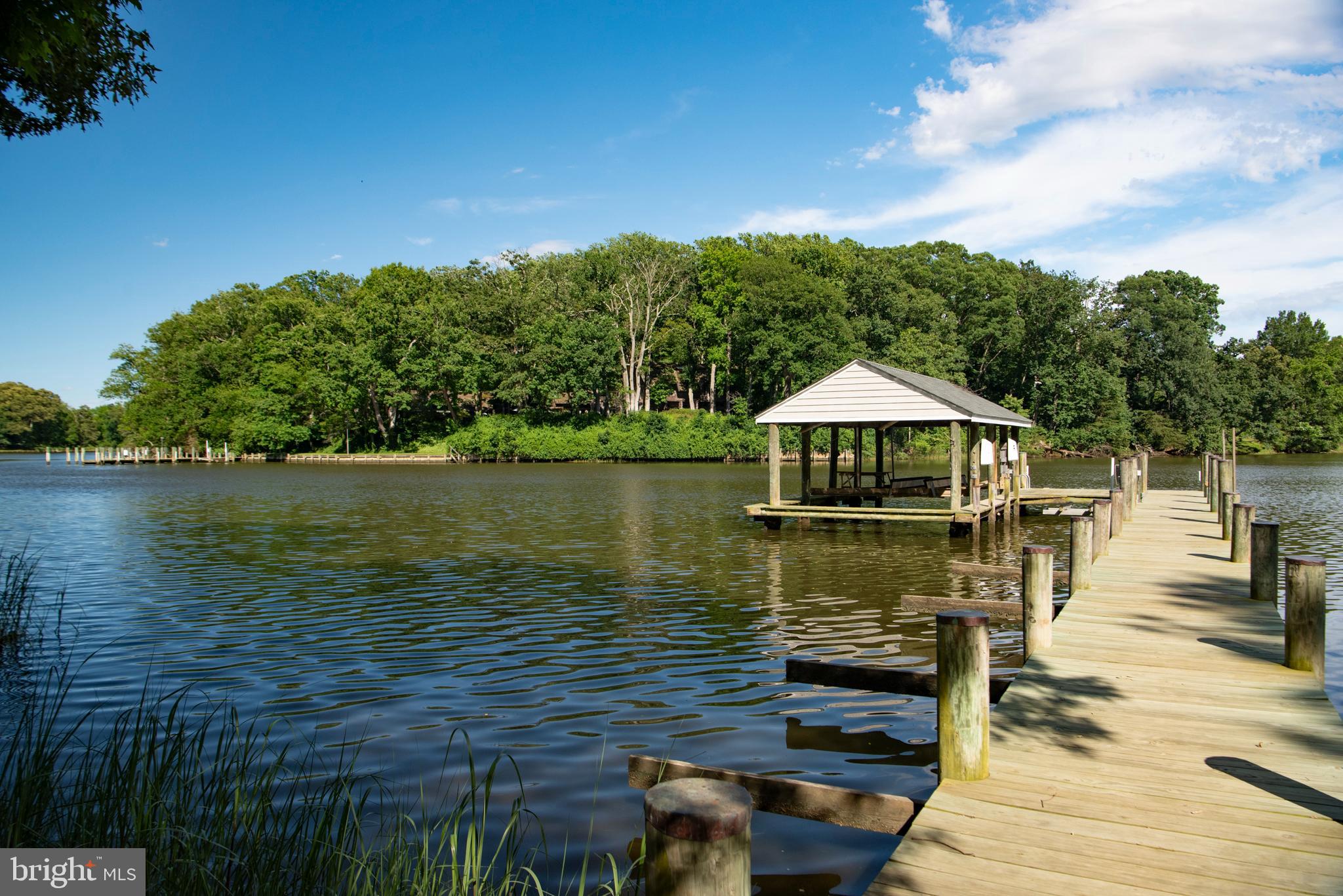 1879 Whitehall Road Annapolis, MD 21409 - Photo 74 of 78 a view of a lake with sitting area