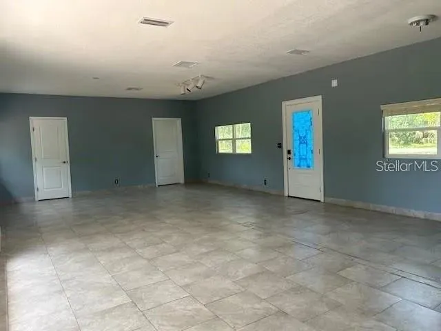 a bathroom with a sink toilet and mirror