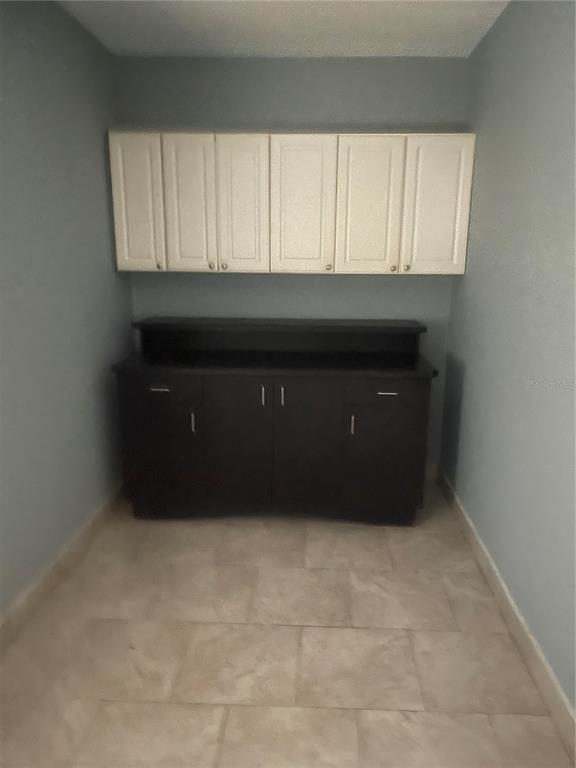 8704 Jackson Springs Road Tampa, FL 33615 - Photo 18 of 21 a closeup of a cabinet