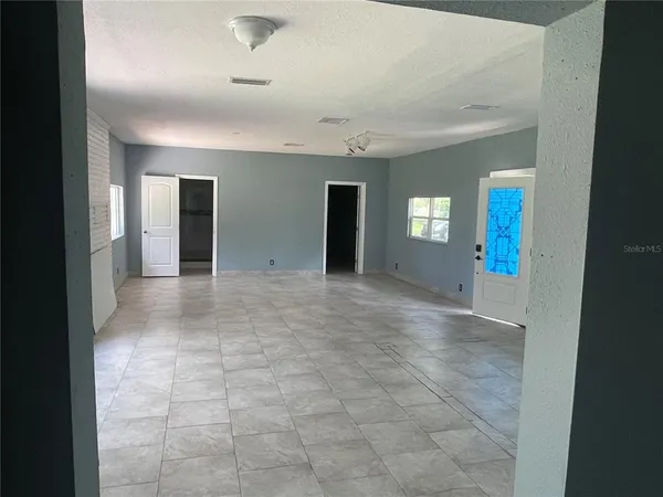 an empty room with windows