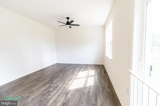 a bathroom with a sink a mirror and shower