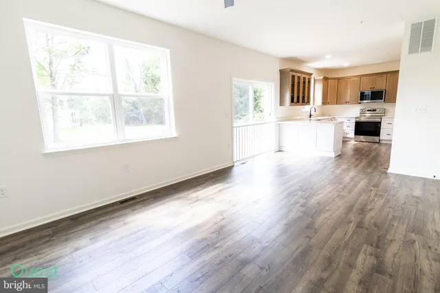 a view of small space with wooden floor
