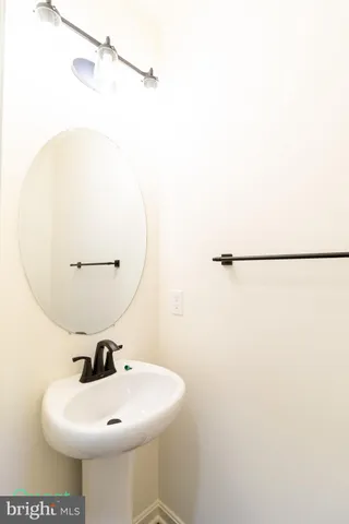 a living room with a ceiling fan