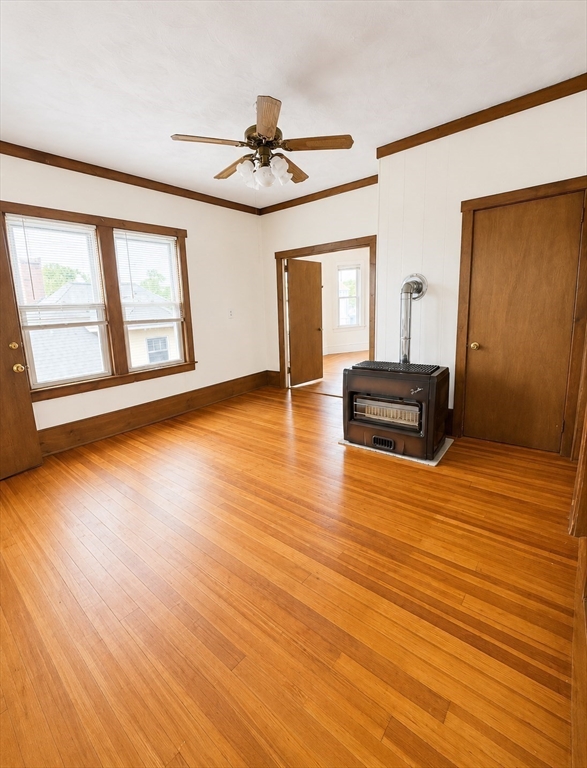 37 Shawmut Street Fall River, MA 02720 - Photo 11 of 16 a view of empty room with wooden floor and fan