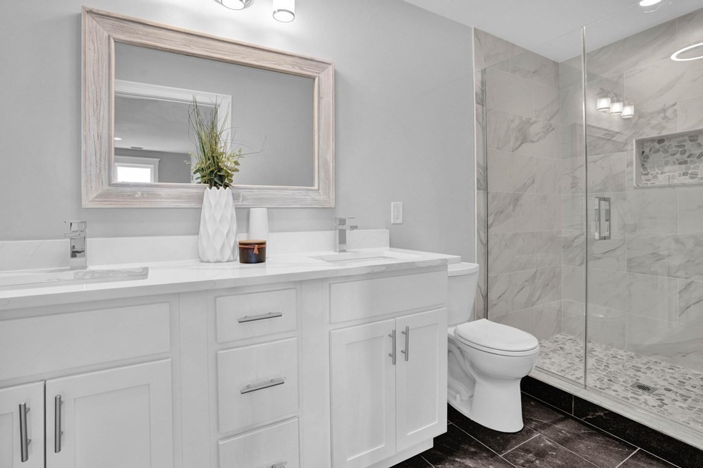 63 Kenmere Road, Unit 2 Medford, MA 02155 - Photo 21 of 42 a bathroom with a sink toilet and shower