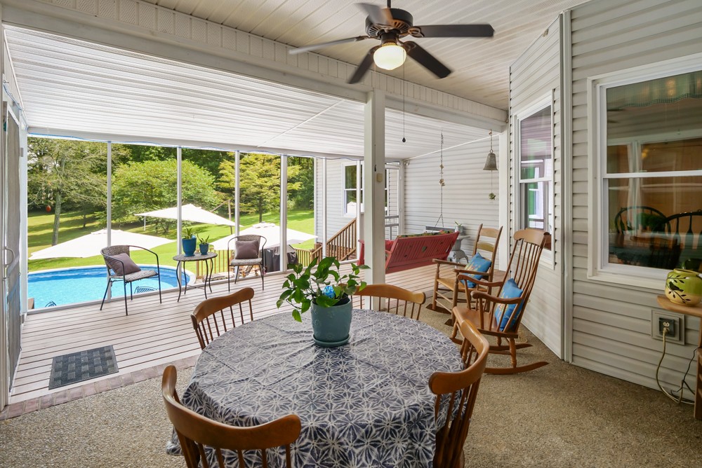 105 Spicer Road Burns, TN 37029 - Photo 28 of 44 a view of a dining room with furniture window and outside view