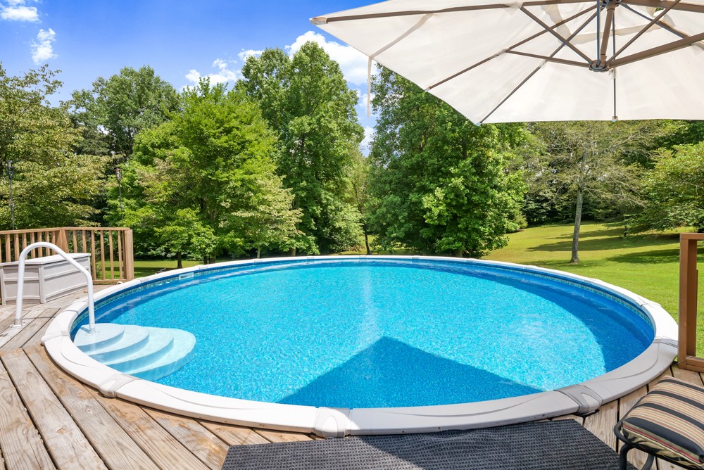 105 Spicer Road Burns, TN 37029 - Photo 32 of 44 a view of outdoor space and swimming pool