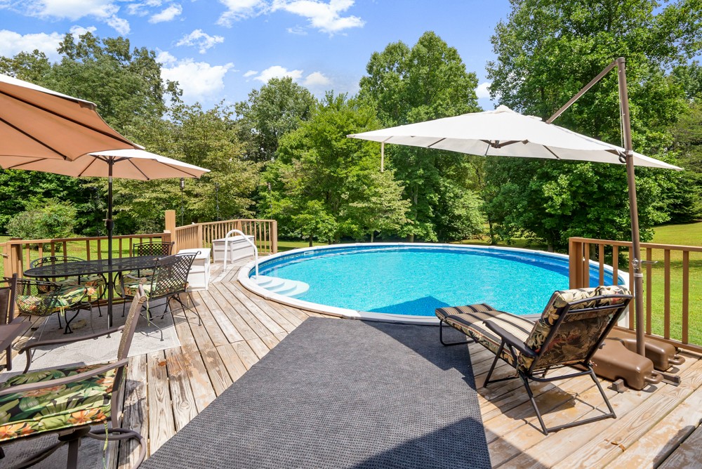 105 Spicer Road Burns, TN 37029 - Photo 33 of 44 a view of a swimming pool with a patio