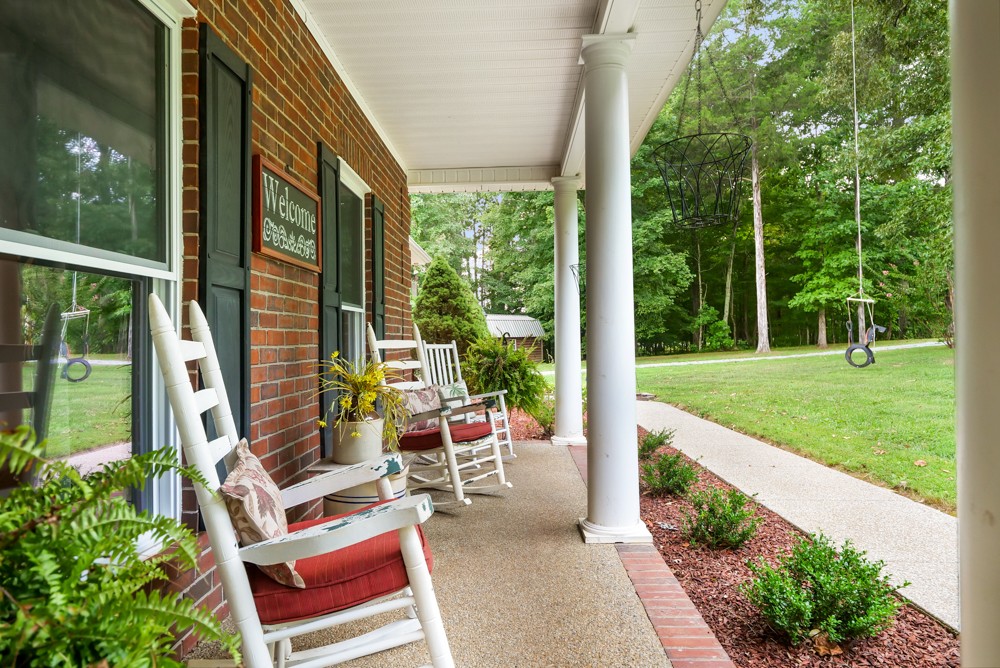 105 Spicer Road Burns, TN 37029 - Photo 8 of 44 a view of yard with patio