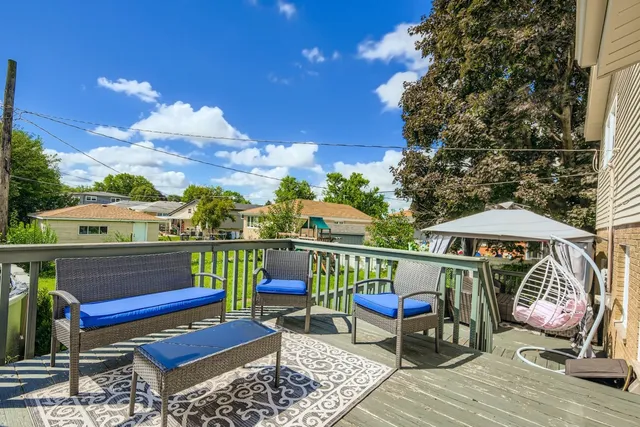 a view of a chairs and table in the terrace