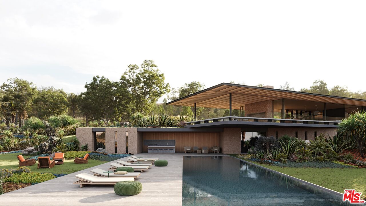 5878 Deerhead Road Malibu, CA 90265 - Photo 1 of 10 a car parked in front of a white house