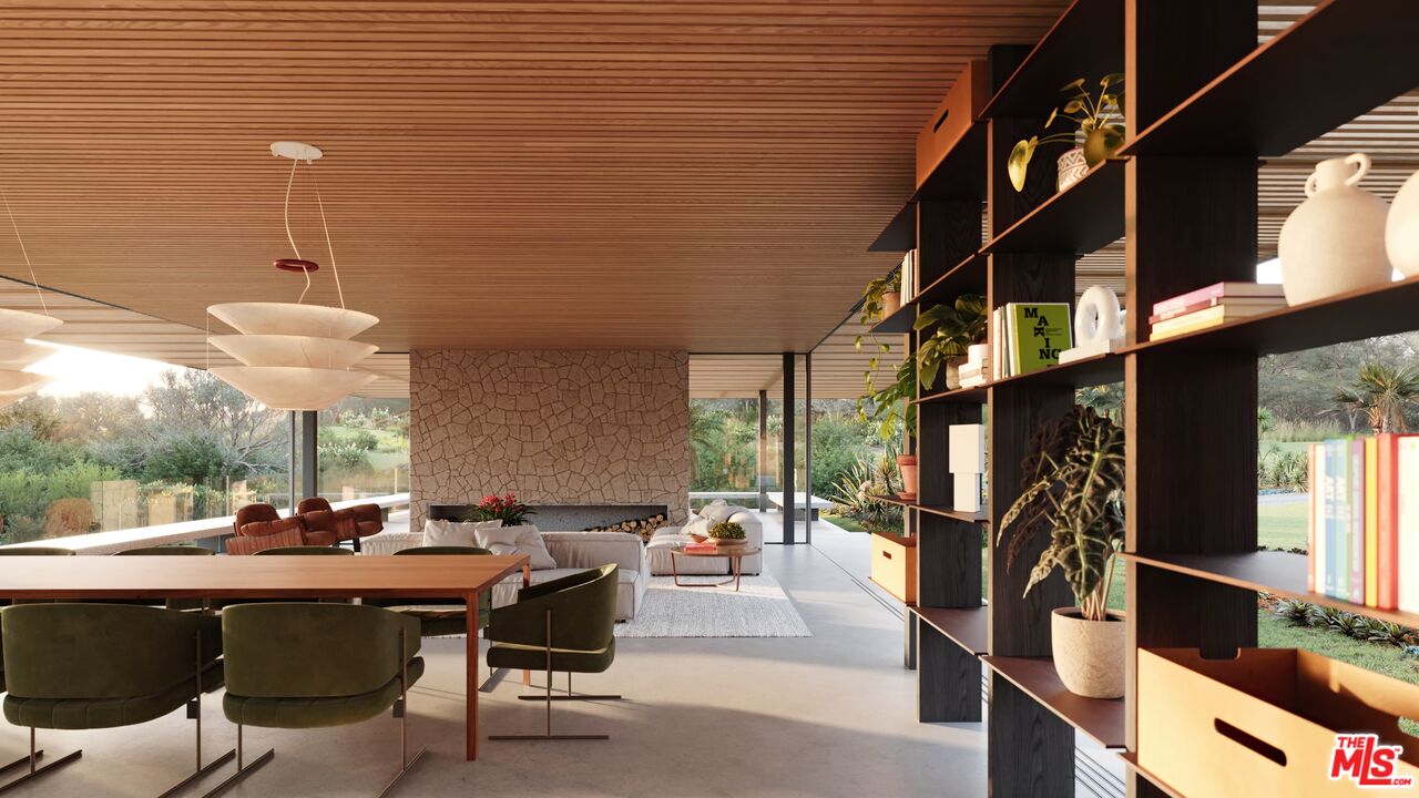 5878 Deerhead Road Malibu, CA 90265 - Photo 6 of 10 a view of a patio with table and chairs