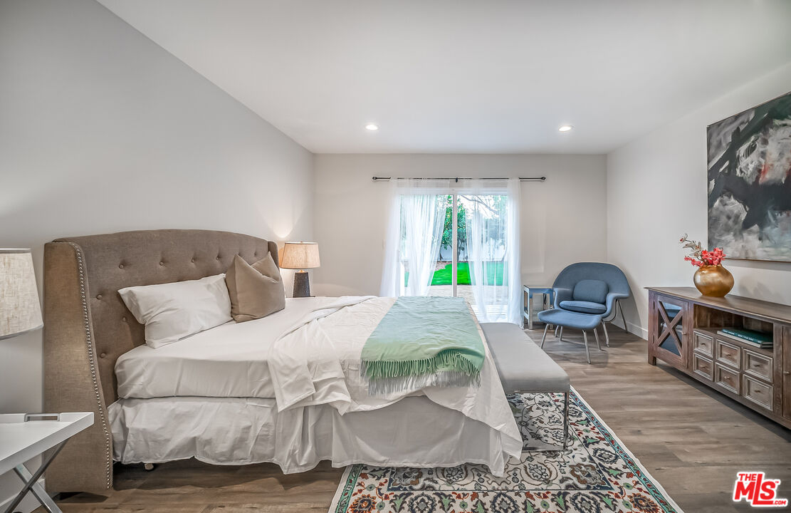 5619 Bellingham Avenue Valley Village, CA 91607 - Photo 23 of 48 a bed room with a bed