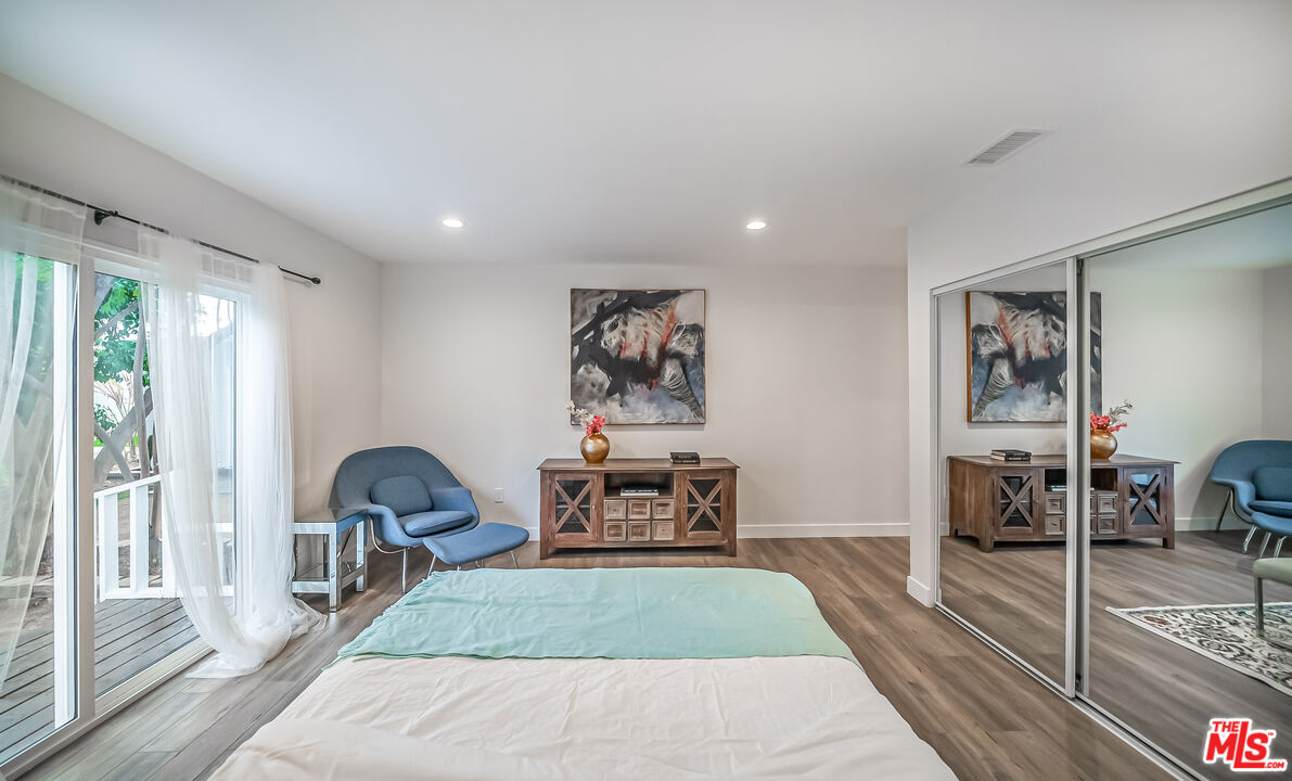 5619 Bellingham Avenue Valley Village, CA 91607 - Photo 24 of 48 a living room with furniture and a fireplace