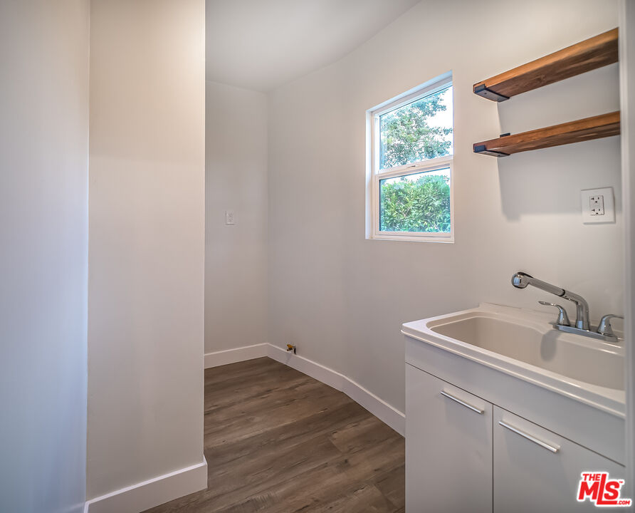 5619 Bellingham Avenue Valley Village, CA 91607 - Photo 30 of 48 a bathroom with a sink and a window