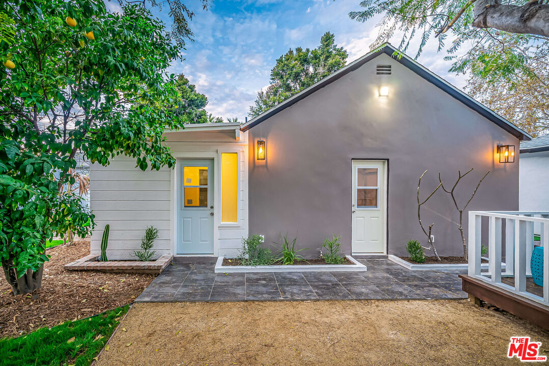 5619 Bellingham Avenue Valley Village, CA 91607 - Photo 33 of 48 a front view of house with yard
