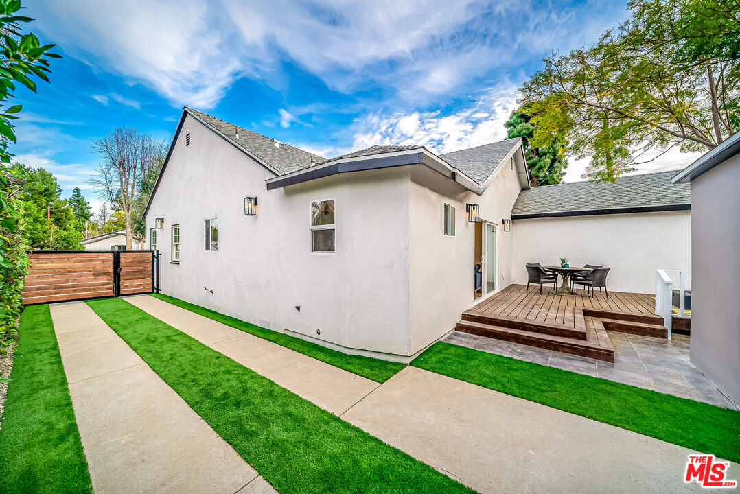 5619 Bellingham Avenue Valley Village, CA 91607 - Photo 41 of 48 a view of a house with a yard and sitting area