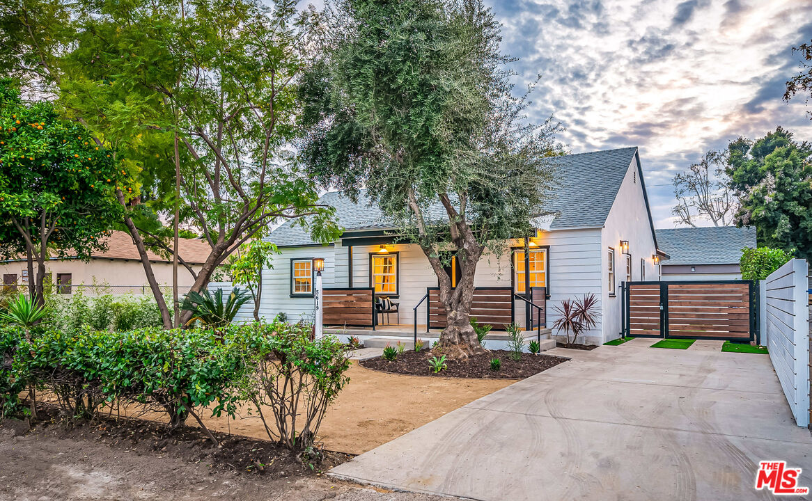 5619 Bellingham Avenue Valley Village, CA 91607 - Photo 6 of 48 a front view of a house with garden