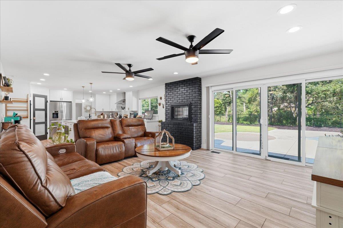 4849 Alexon Way Carmichael, CA 95608 - Photo 11 of 50 a living room with furniture and a large window