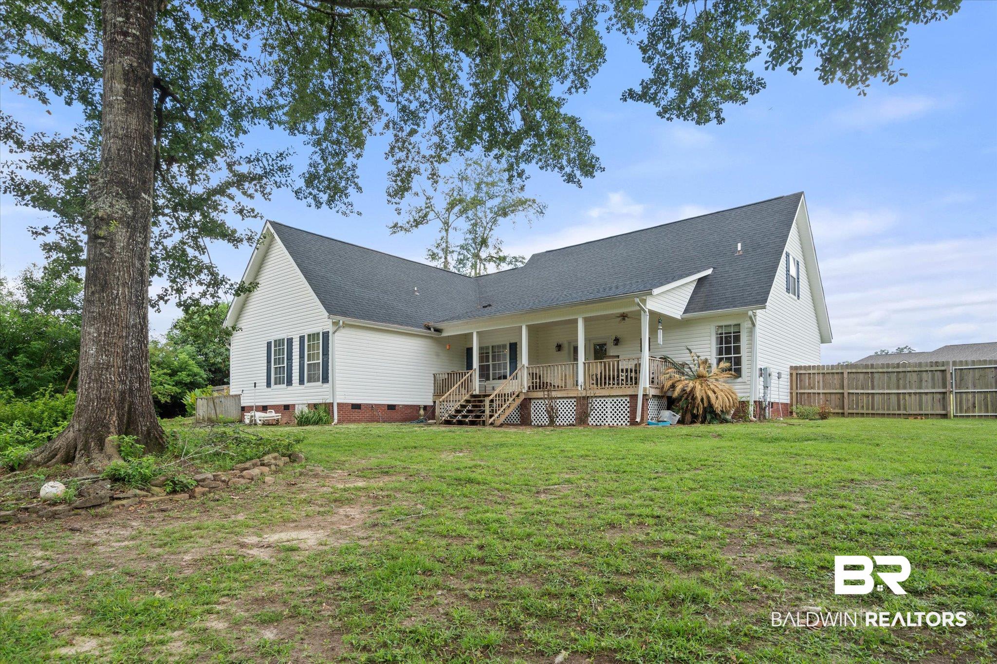 22760 Ridgewood Drive Robertsdale, AL 36567 - Photo 29 of 44 Back of house featuring crawl space and a shingled roof