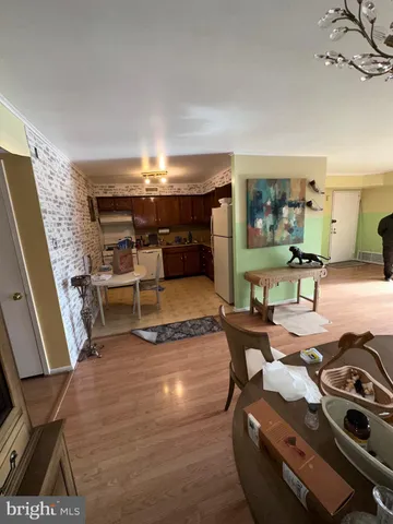 a room with furniture and a flat screen tv