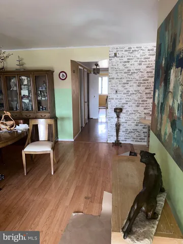 a view of livingroom with furniture and window