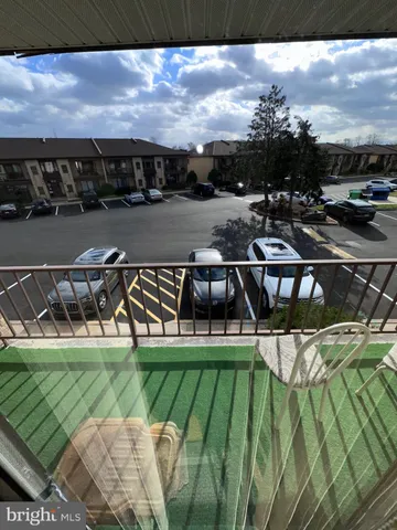 a view of swimming pool with outdoor seating