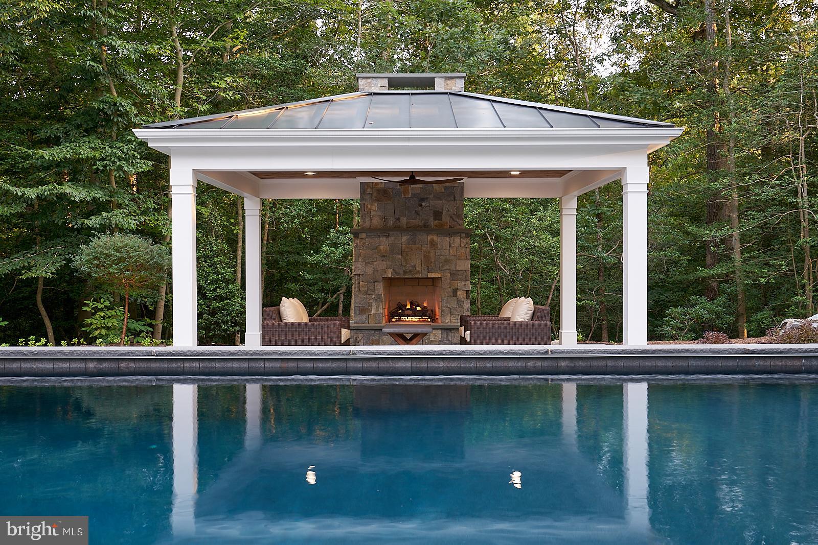 511 Broad Stream Lane Riva, MD 21140 - Photo 5 of 92 Poolside pavilion w/ stone chimney & gas fireplace