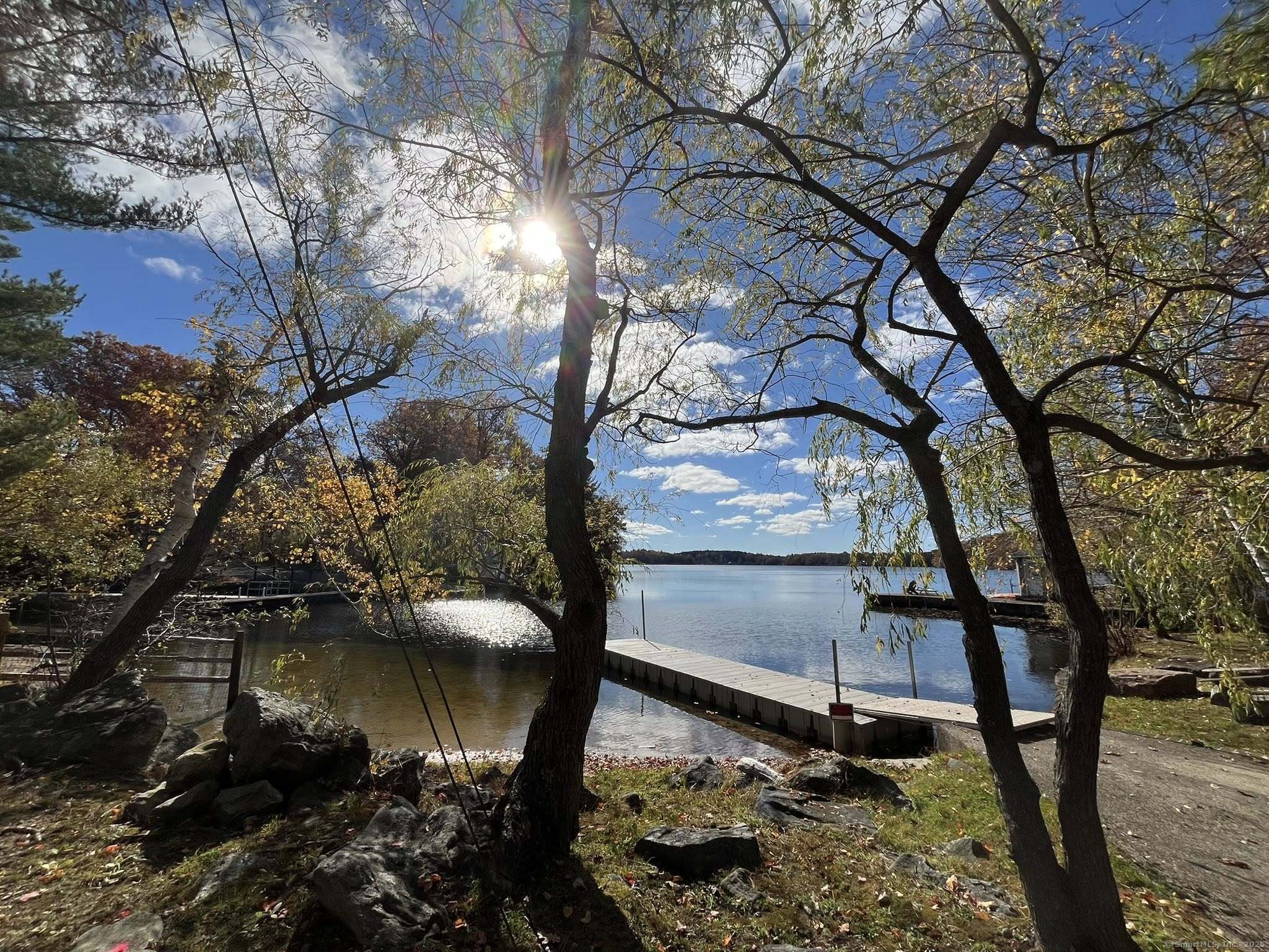 200 West West Hill Road Barkhamsted, CT 06063 - Photo 24 of 25 a backyard of a house with lots of green space