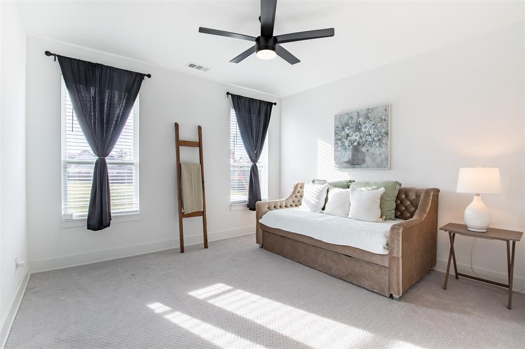111 Bluegrass Trail Springtown, TX 76082 - Photo 30 of 37 Secondary bedroom with natural light overlooking the backyard.