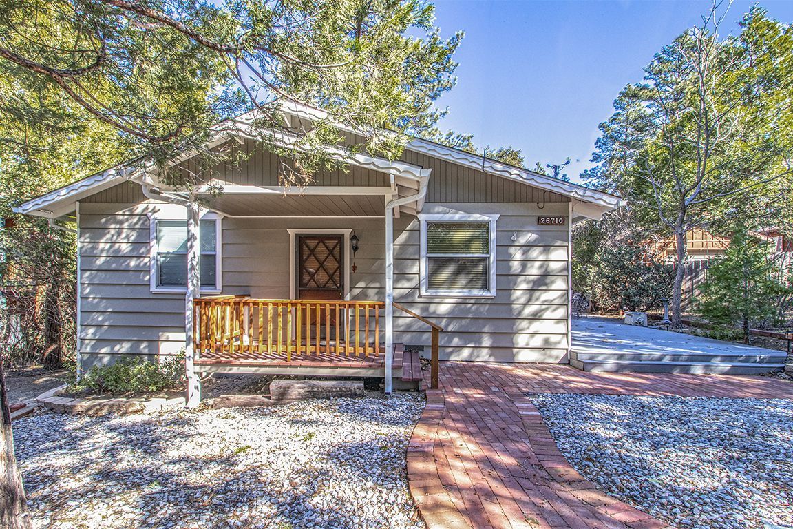 26710 Mc Mahon Road Idyllwild, CA 92549 - Photo 1 of 35 a front view of a house with a yard