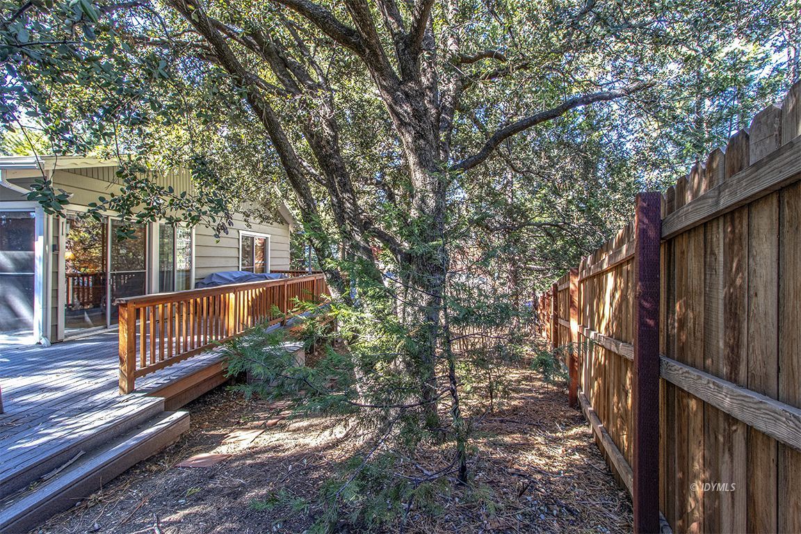 26710 Mc Mahon Road Idyllwild, CA 92549 - Photo 25 of 35 a view of backyard with deck and outdoor seating
