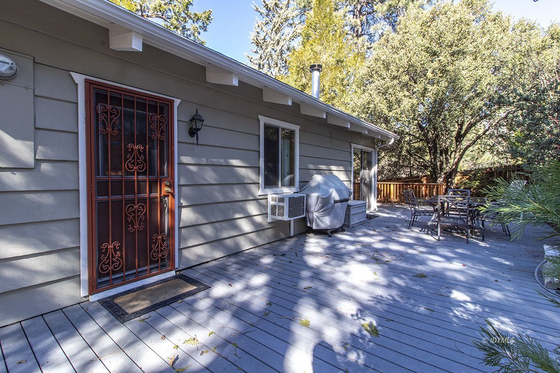 26710 Mc Mahon Road Idyllwild, CA 92549 - Photo 29 of 35 a view of a chairs in a back yard of the house