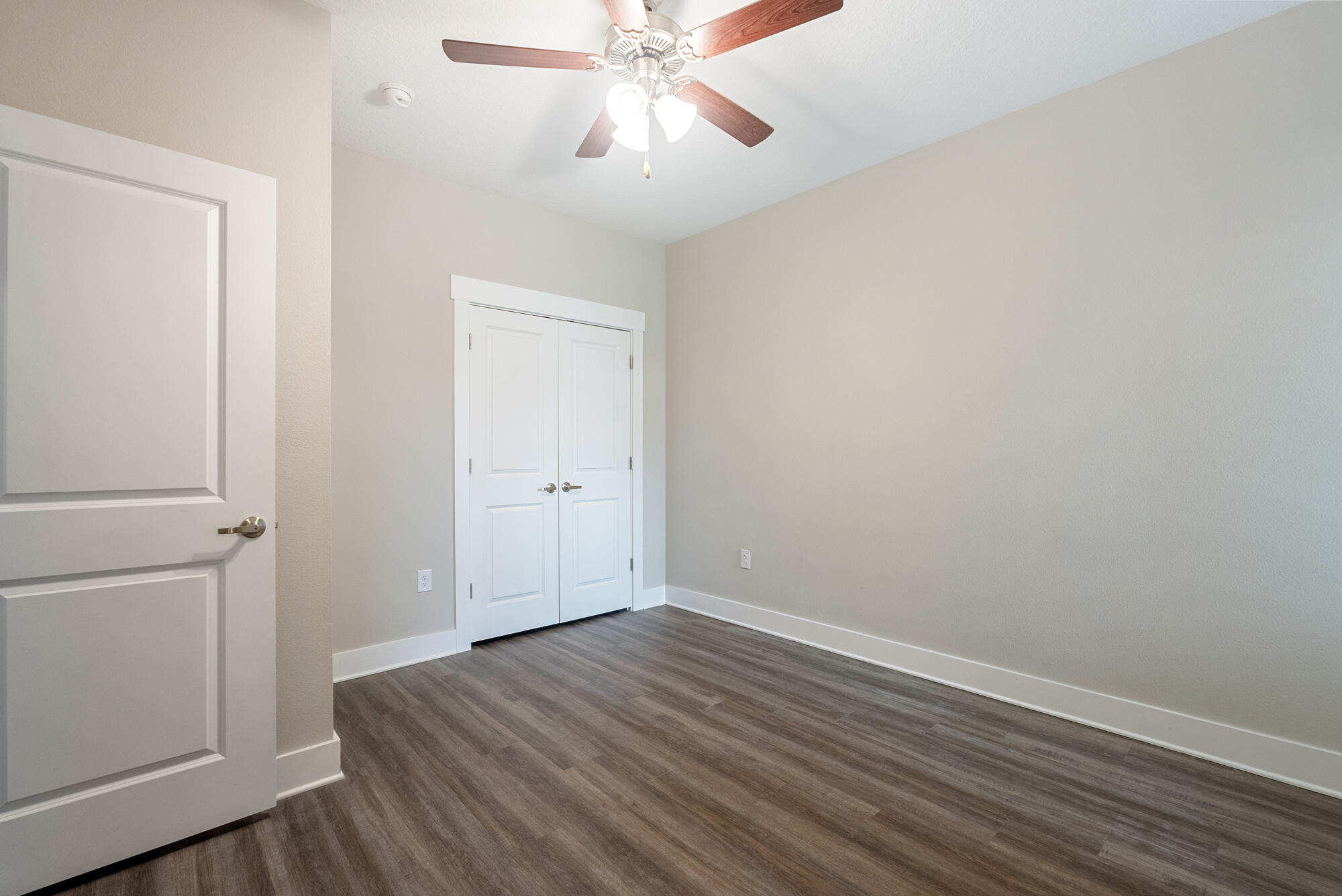 294 Date Palm Lane Freeport, FL 32439 - Photo 12 of 28 wooden floor in an empty room