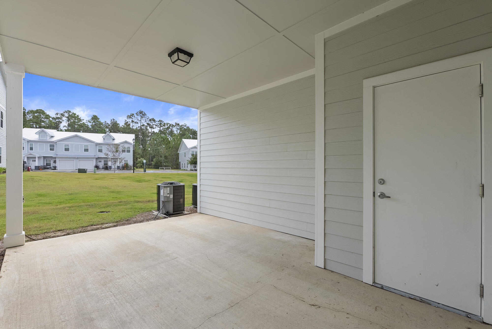 294 Date Palm Lane Freeport, FL 32439 - Photo 18 of 28 a view of an empty room with a floor to ceiling window and yard