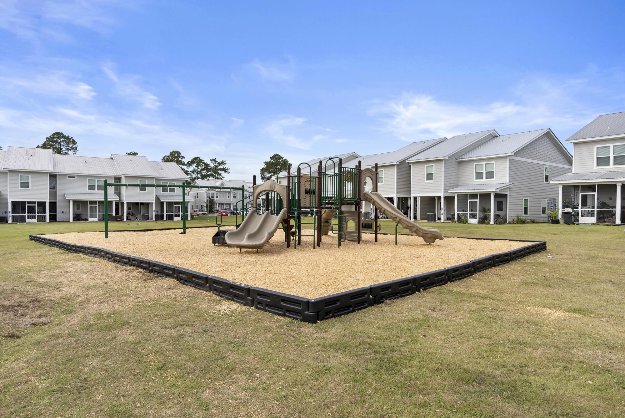 294 Date Palm Lane Freeport, FL 32439 - Photo 24 of 28 a view of a house with swimming pool