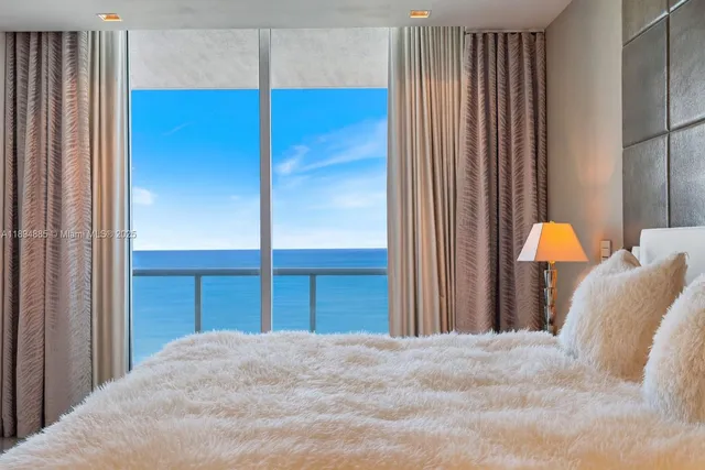 a bedroom with a bed and a closet