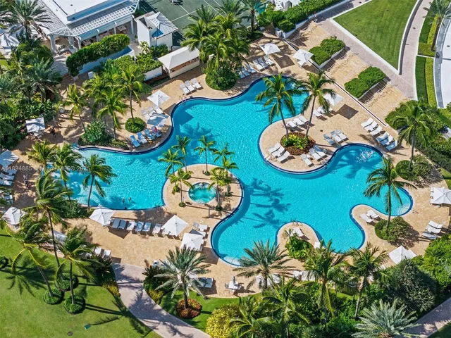 a view of a street with a building in the background