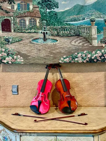 an aerial view of a house with a lake view