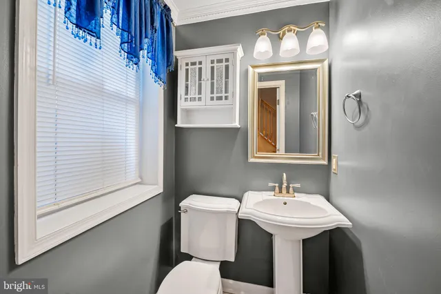 a view of a hallway with windows