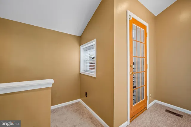 a bathroom with a sink a mirror and a bathtub