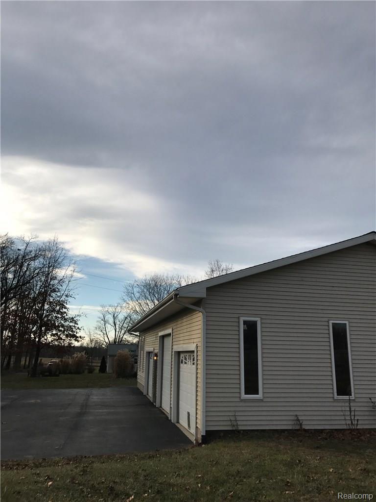625 Brogan Road Webberville, MI 48892 - Photo 14 of 71 Garage side opposite Man Cave Area