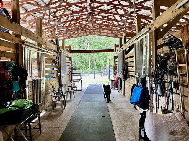 a view of a bench sitting in middle of a yard