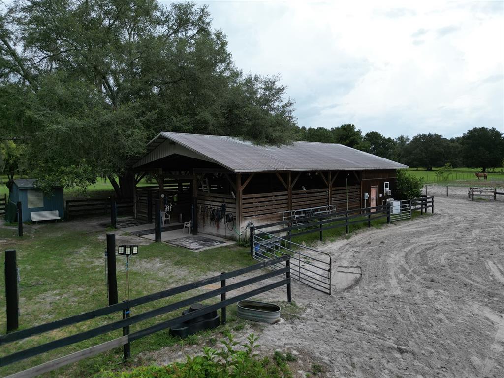 Southwest 107th Street Archer, FL 32618 - Photo 19 of 25 a front view of a house with garden