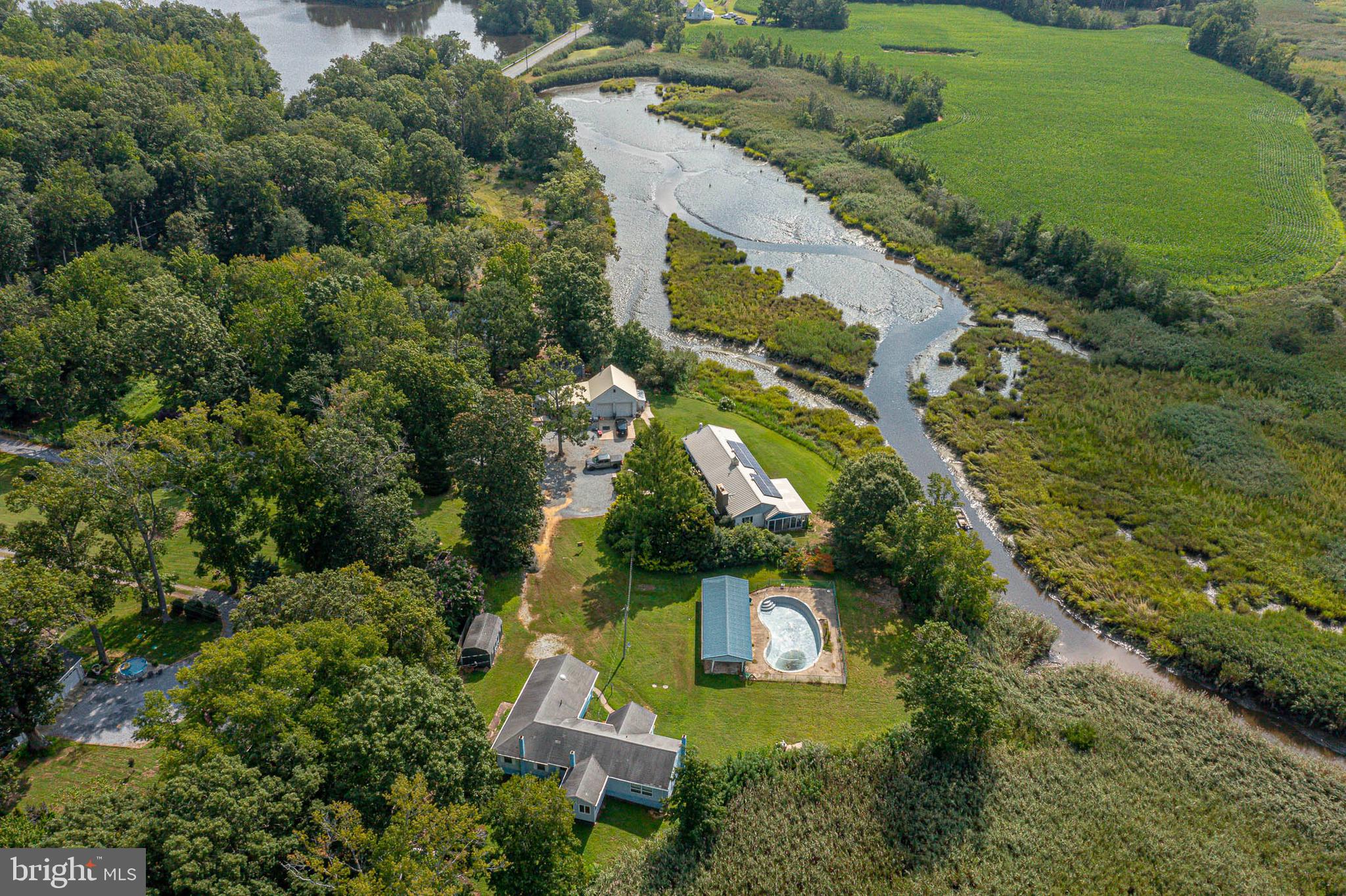 69 Buckhorn Road Salem, NJ 08079 - Photo 1 of 38 an aerial view of house with yard swimming pool and outdoor seating