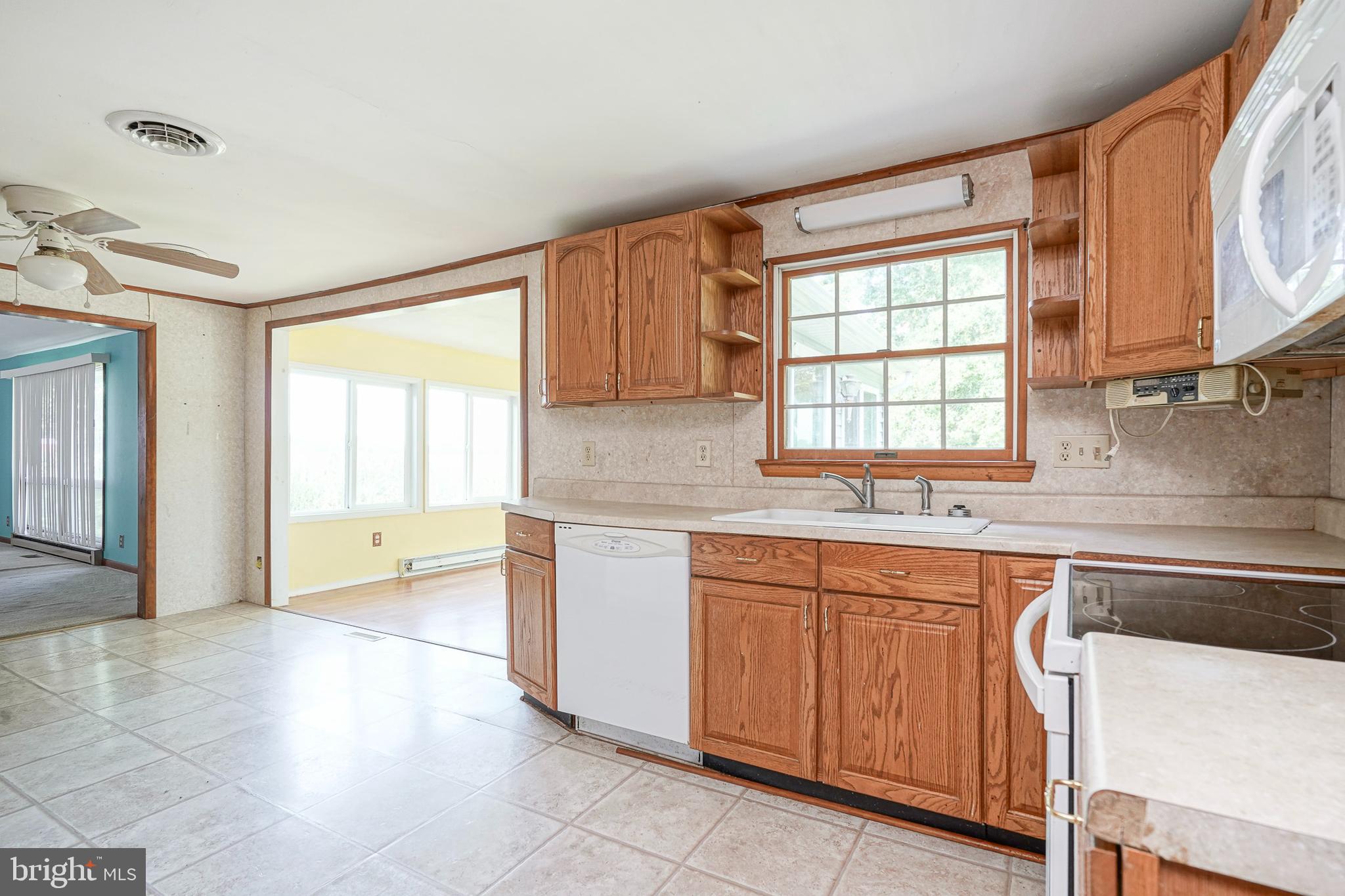 69 Buckhorn Road Salem, NJ 08079 - Photo 12 of 38 a kitchen with a sink and a window